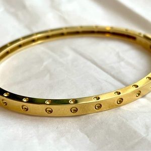 $3300 Roberto Coin 18K Yellow
Gold Symphony Love Bangle
Bracelet - Pre-Owned